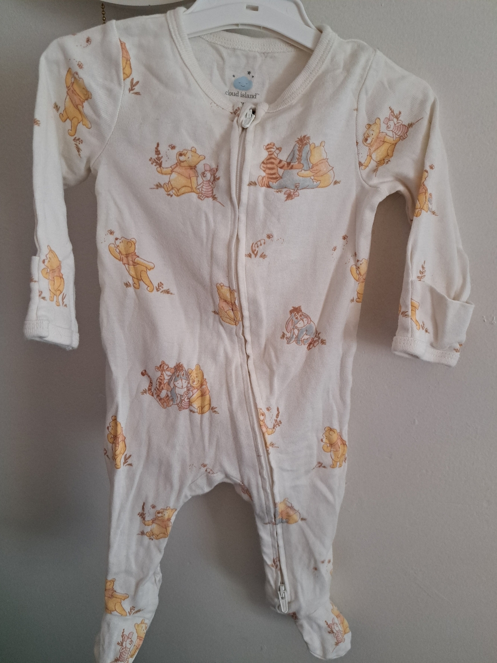 cloud island Cream Winnie the Pooh Zip Footed One-Piece